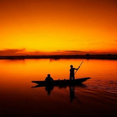 Angler at the river bank